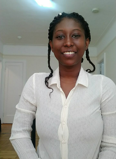 York College Student Hastride Poses for a photo.