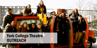 Student actors standing and sitting on top of York College red van.