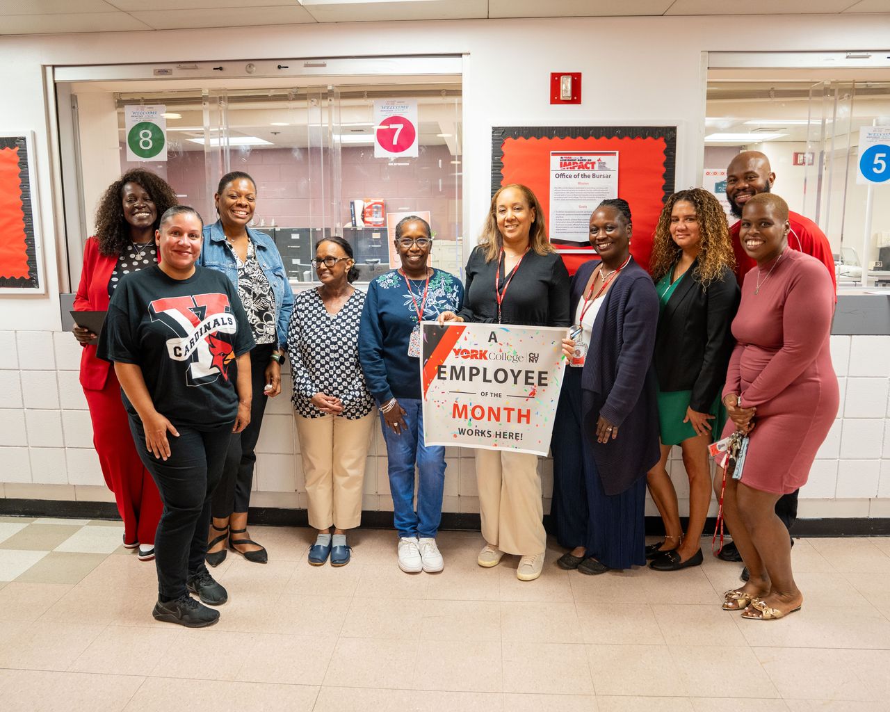 President Claudia Schrader (far left rear) enjoying the celebration with members of the Bursar's staff and members of the nominating committee.