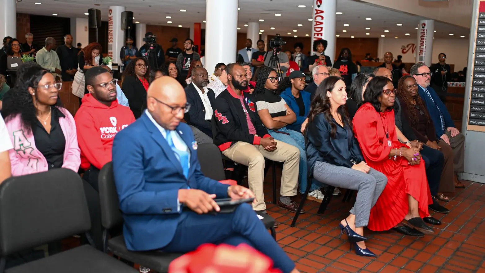 Crowd shot featuring in the forefront, Hon. Donavan Richards and Interim Chief of Staff Nyisha Howell.