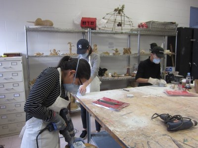 Students working on sculpture