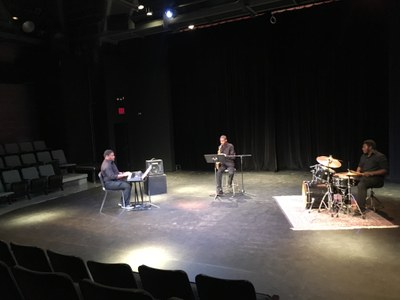 Students performing in the Performing Arts Center little theater.